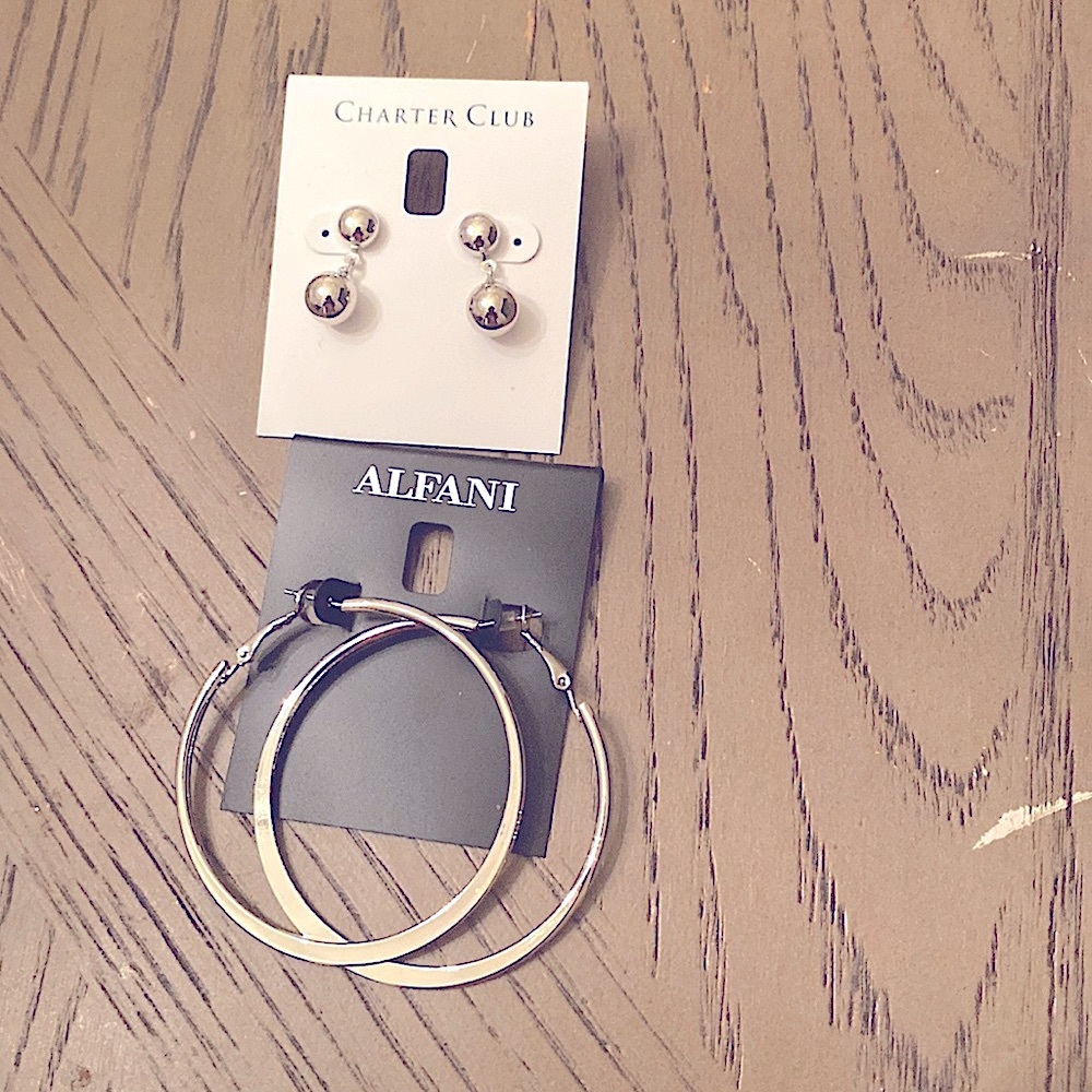 Silver tone earrings.  Two pairs
